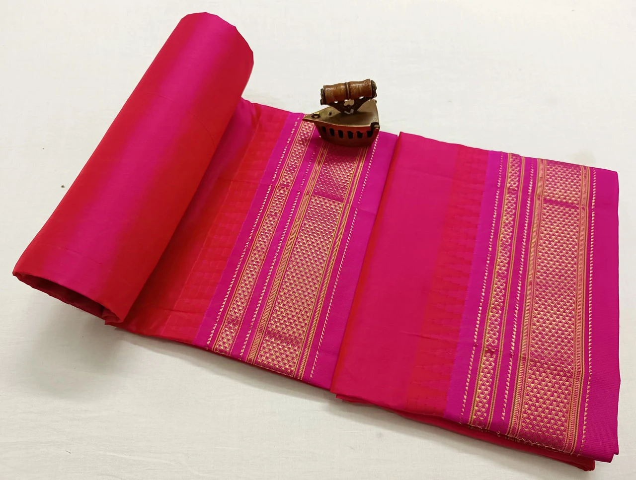 Pink Ilkaal plain pure saree with Pink zari border and traditional woven design