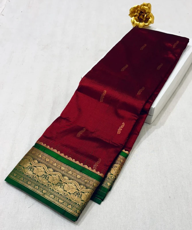 Maroon Kanchipuram pure silk saree with Green and Gold zari border