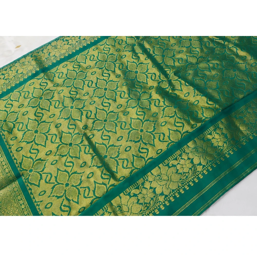 Green traditional silk saree with zari border for festive and wedding occasions