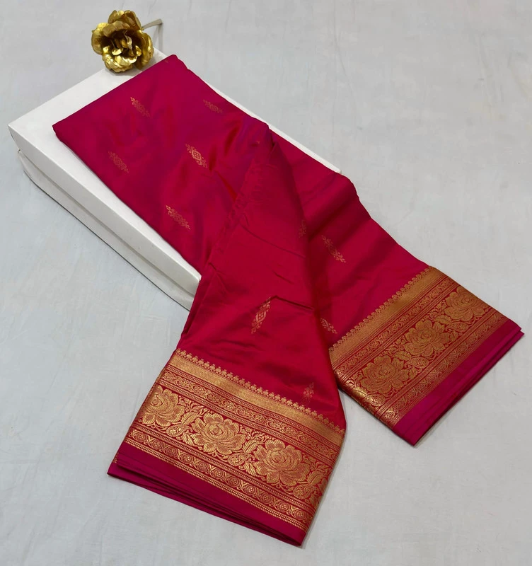 Turquoise traditional silk saree with zari border for festive and wedding occasions