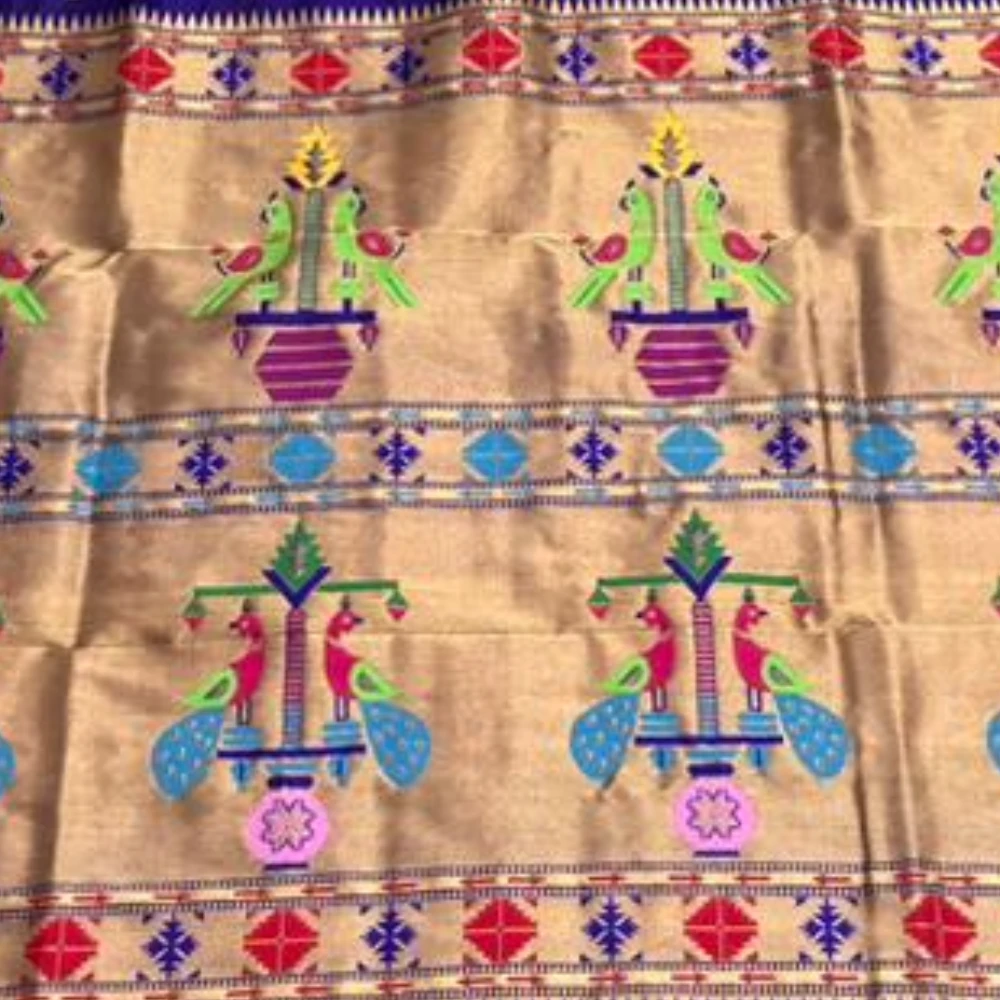 Exclusive Maroon Paithani self color pure silk saree with gold zari border, traditional Meena butta weaving and handwoven craftsmanship.