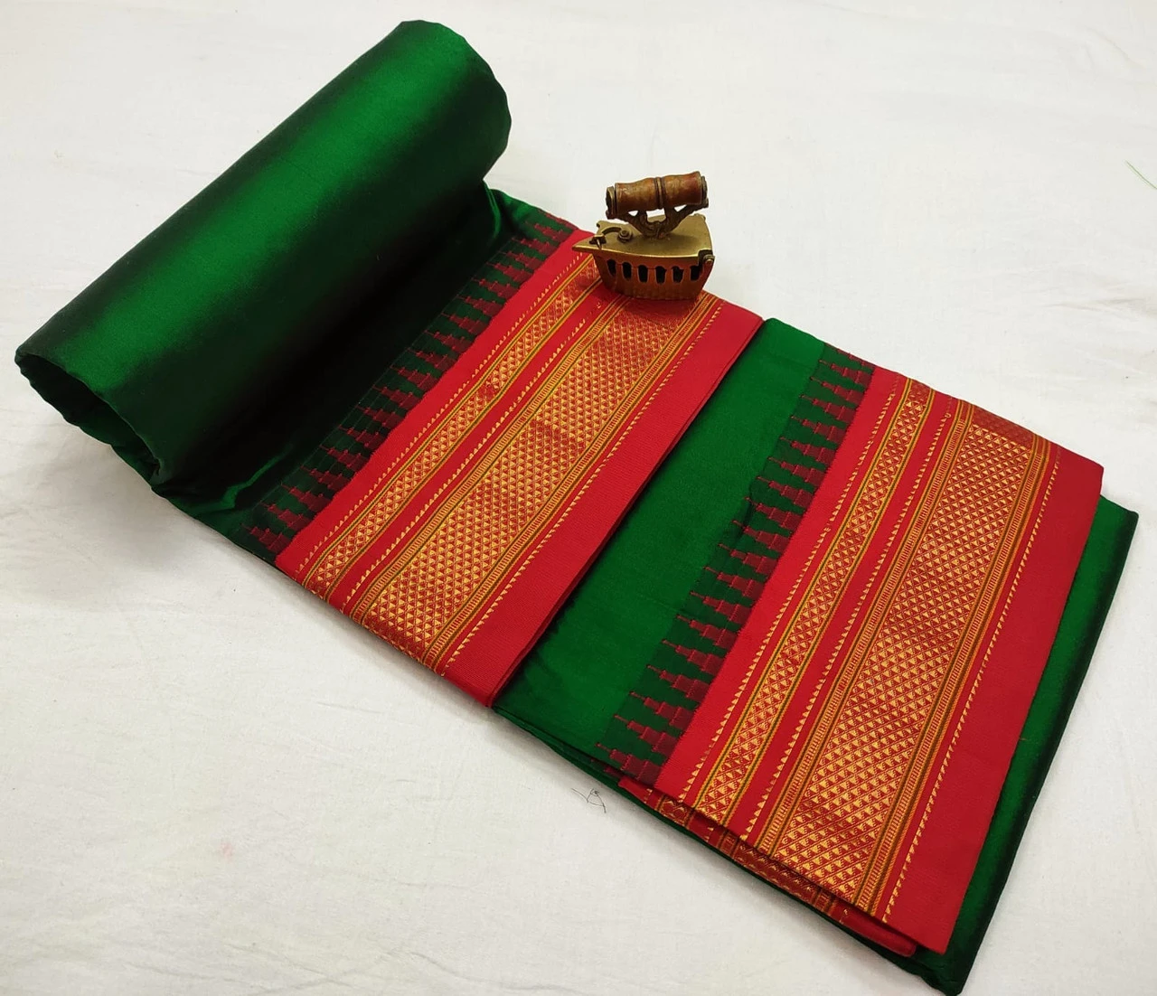 Bottle Green Ilkaal plain pure saree with Red zari border and traditional woven design