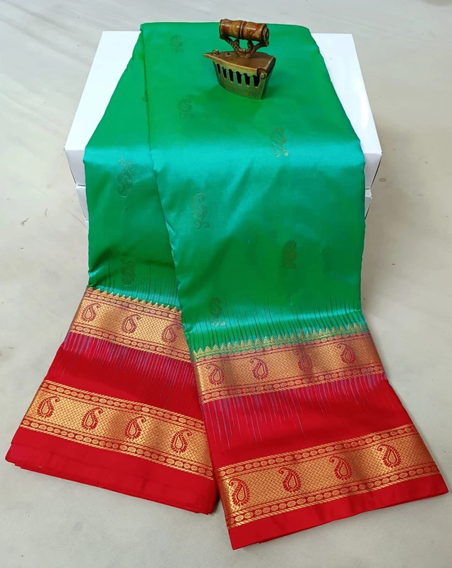 Emerald Green and Red Kanchipuram silk saree with Bentex border and golden motifs