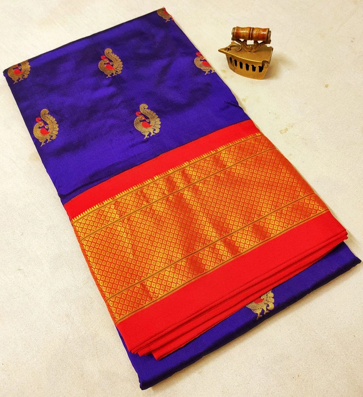 Royal Blue Pure Silk Paithani Saree featuring luxurious silk fabric, rich zari woven borders, elegant traditional motifs