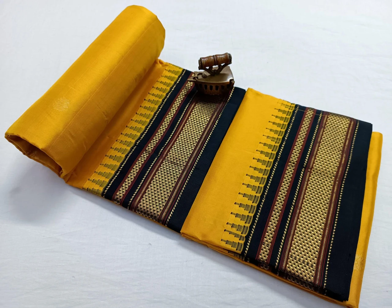 Mustard and Black Ilkaal Butta pure silk saree with zari border and traditional weaving