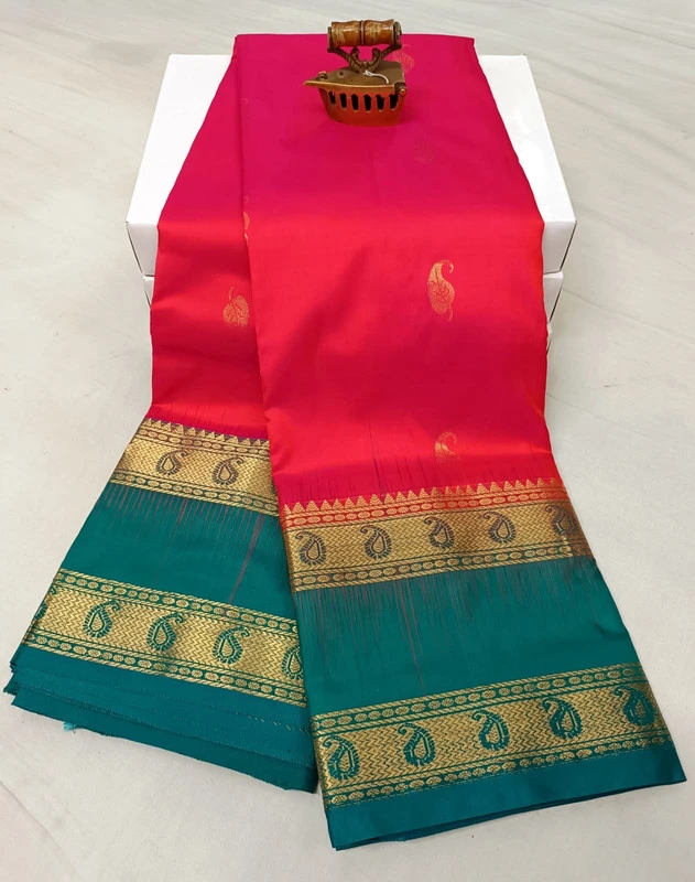 Pink and Green Kanchipuram silk saree with Bentex border and golden motifs