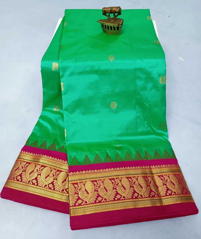 Green with Rani Contrast Gadwal traditional silk saree with zari border for festive and wedding occasions